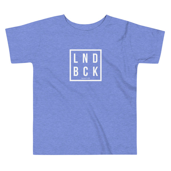 Just Out Here Tryna Get Our LND BCK Toddler Tee
